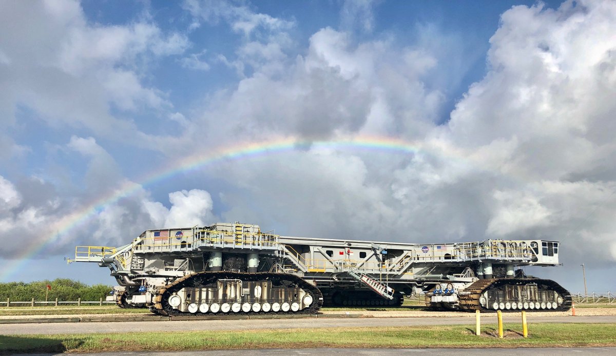 📷 Captured today: Awesome photo of crawler-transporter 2 surrounded by a rainbow after moving the 10.5-million-pound mobile launcher out to Launch Pad 39B for #Artemis I preparations at @NASAKennedy.