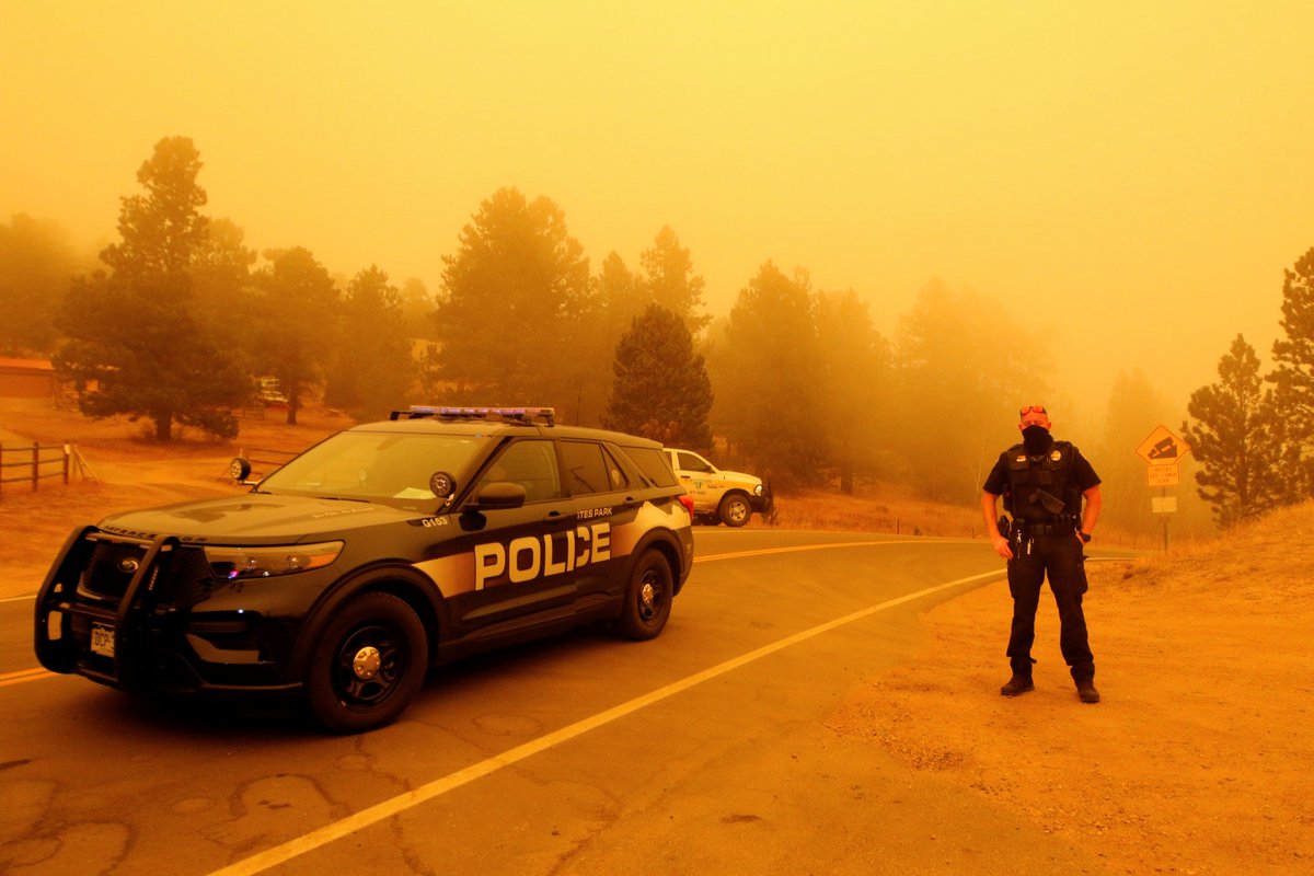 Estes Park officer Andrew Johnson lives down this hill in Glen Haven, which was hit hard by the floods here in 2013. He evacuated a week ago, and he sure hopes his home is ok. The hamlet is home to a lot of law enforcement, and the situation has made their jobs more complicated.