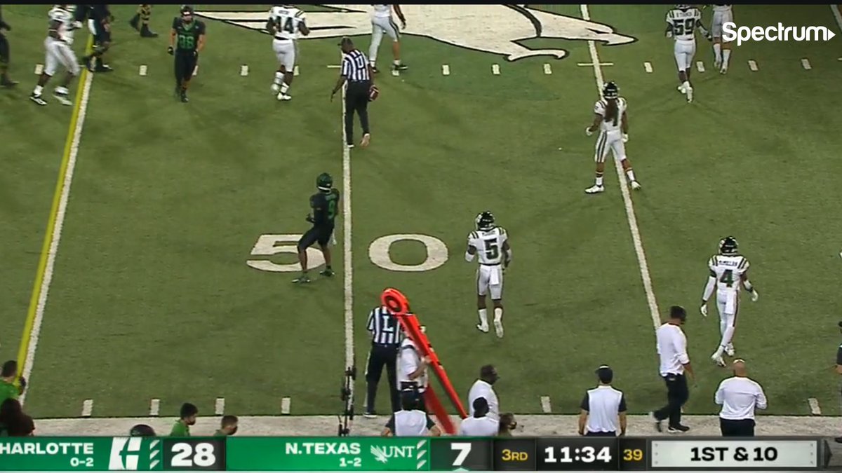 North Texas is REALLY trying here and the matte black helmets are some of the best I've ever seen. But again, this is where number outlines are vital.Nobody can read anything, but if you highlight them even slightly, green-on-black is completely doable. Doesn't work here.