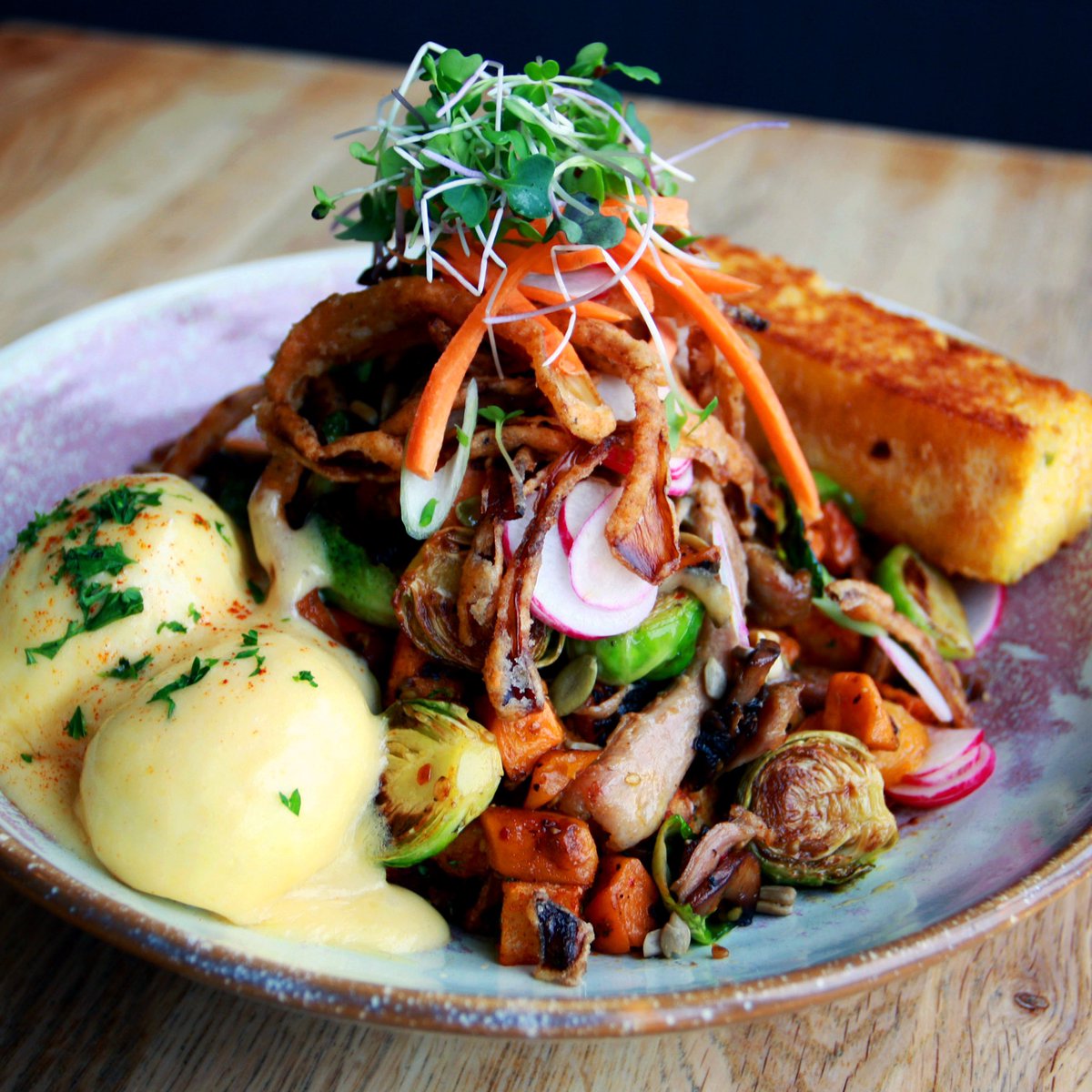 When everything you’re thankful for is piled oh-so high in a big bowl of awesome... confit turkey hash bowl with sweet potatoes, roasted Brussels sprouts, cherry tomatoes, radishes, poached eggs, and toasted corn bread... 🙌🏼🙌🏼 #yyc