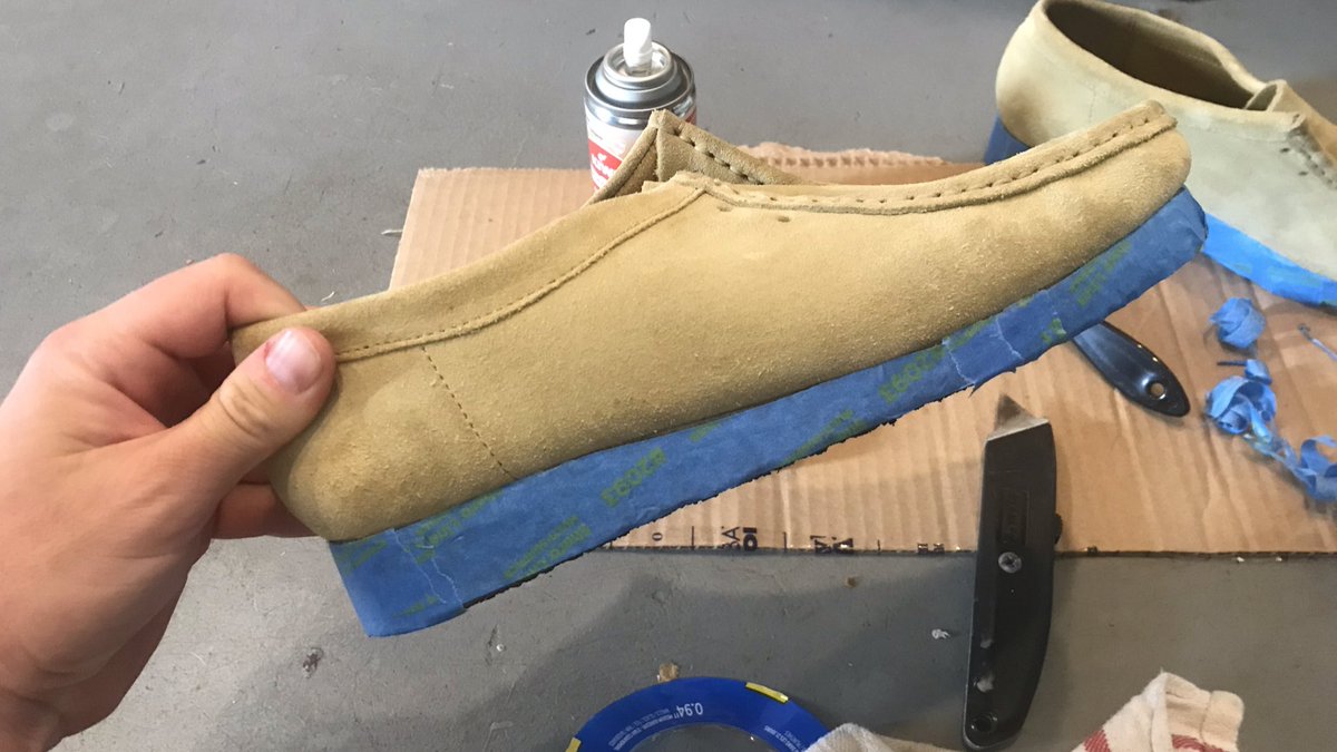 Next step was painters tape around the crepe sole and the bottom of the suede upper. Once I had it covered, I gently took a box cutter to the crevice between, allowing me to strip the tape, and giving me a clean line for the dye.