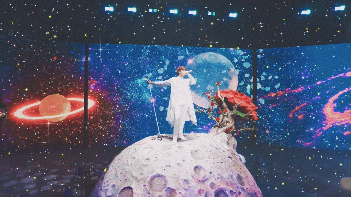 I really do not think enough  #ARMY know that this isn't just "Seokjin in space." This is a "The Little Prince" set. Im gonna break it down a bit using this photo from  @cookiesntae because it's the BEST of the stage.