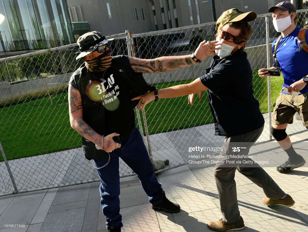 The Antifa shooter is clearly shown here reaching for the victim's mace, and getting bitch slapped like a little pussy by Chad Anti-Communist Protester He was humiliated, and shot him in the head in reprisal.Would a real security guard act like this? #denvershooting