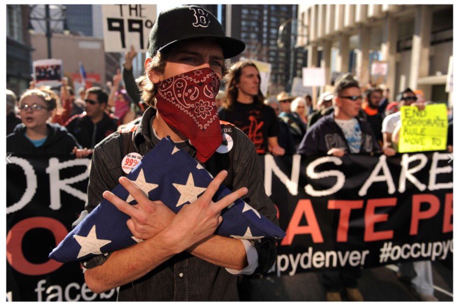 Here Matt is pictured at Occupy Wall St. He had a very extensive past of Activism and speaking out against corporations and the police.He’s been heavily involved in  #Occupy which later pushed members to ANTIFA.