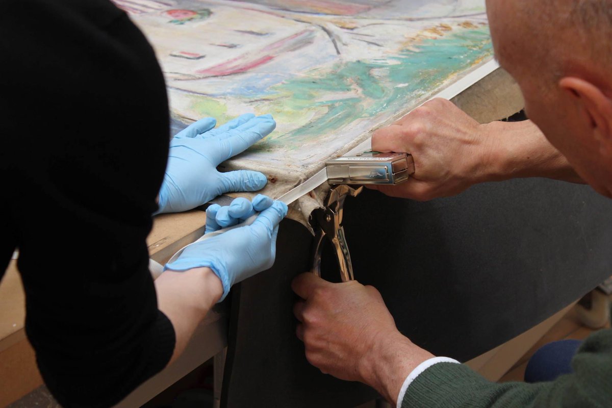 The painting was then re-stretched and fixed with staples on its original stretcher.The stretcher itself had been dry-cleaned in advance of this with smoke sponges and treated with beeswax to seal all woodworm holes as a preventative measure.