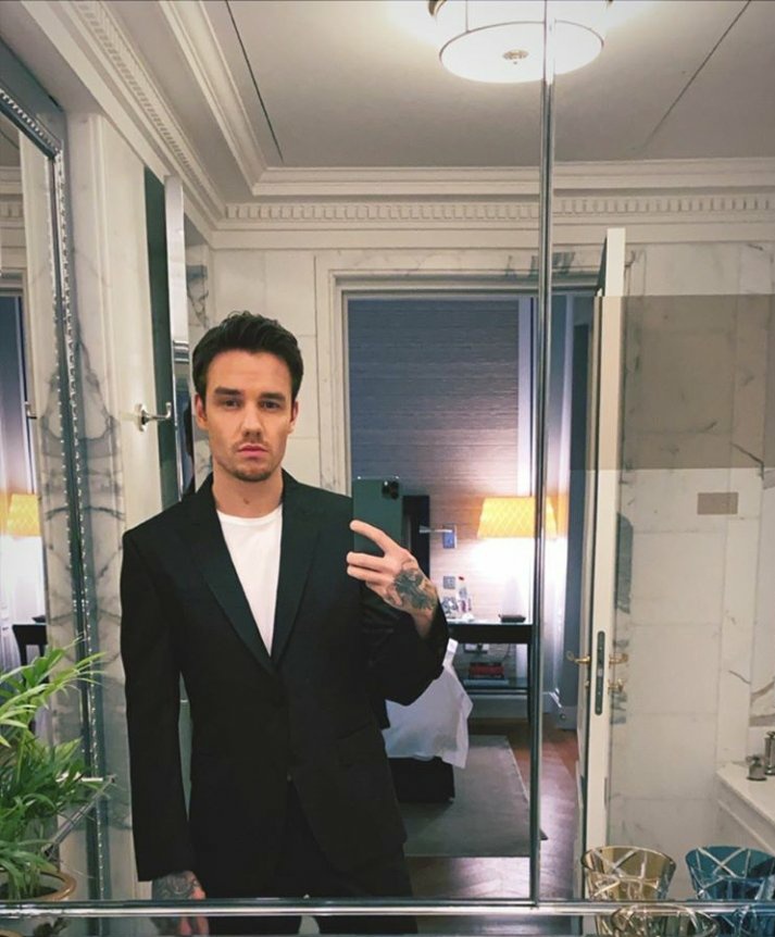 Liam Payne in suit ; a necessary thread.