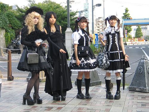 Some examples of (black) old school lolita! Note the similarities. The third picture is a really great comparison. On the far left is gothic lolita, and the two on the right are old school. It's called that because it's from before a lot of brands and substyles were started