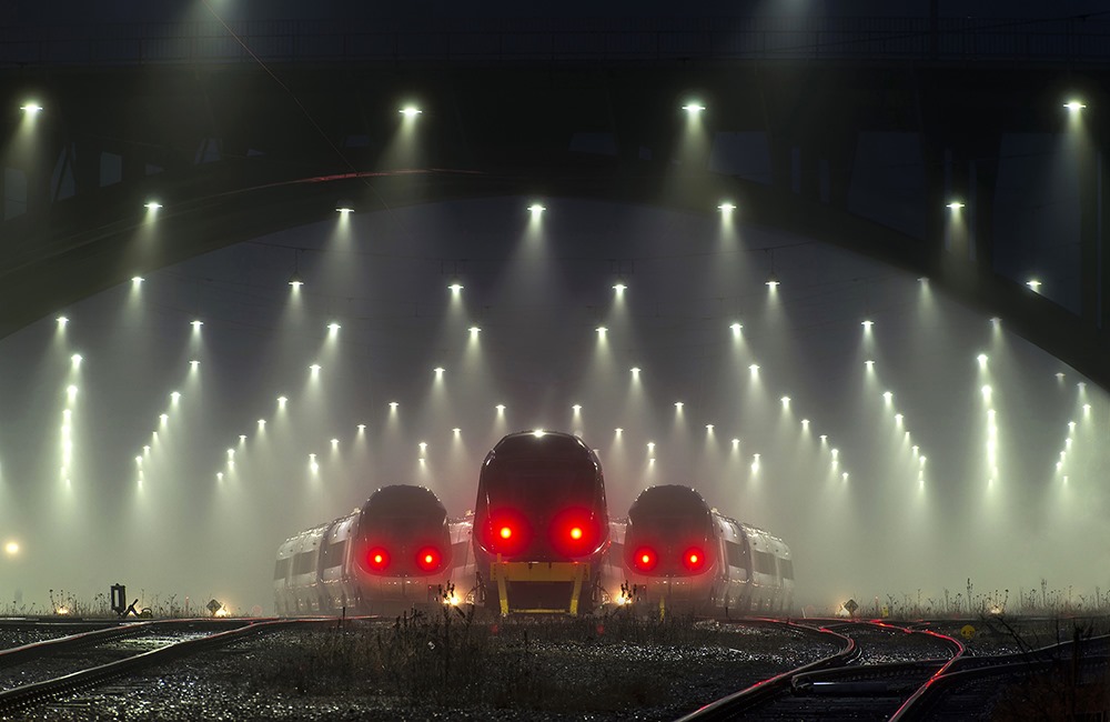 Michael Knudsen. Train station by night, Denmark.