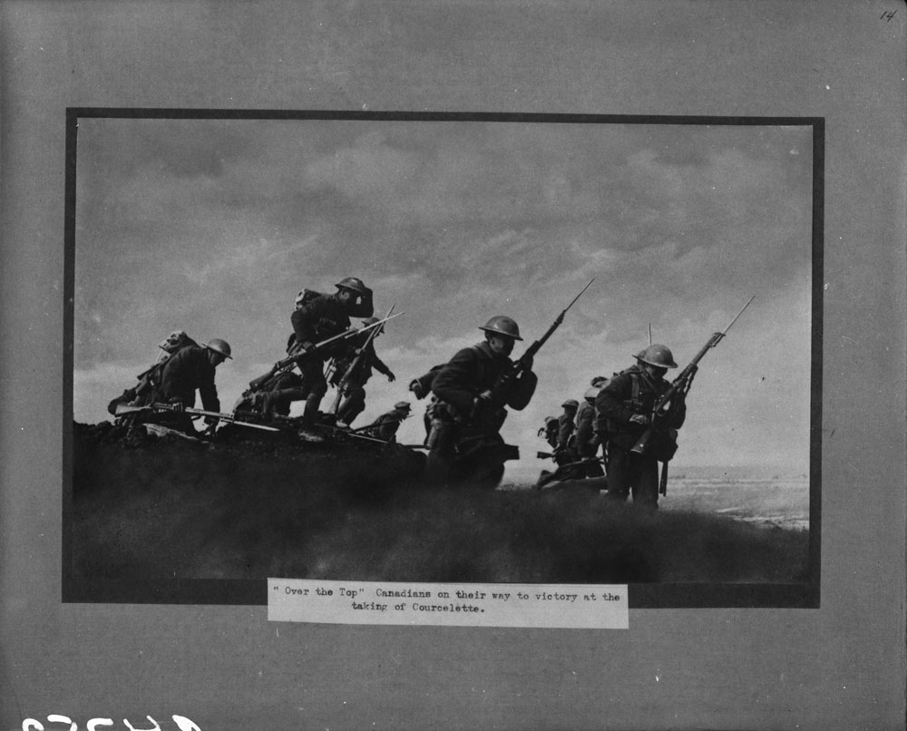 You’ll still see one or two men wearing soft caps instead of helmets. And obviously to get photographs from this angle would put Castle’s back to the enemy. The position of the photographer tends to be a telltale sign for staged photographs.