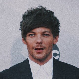 i just think that louis tomlinson wearing a sparkly suit, a thread