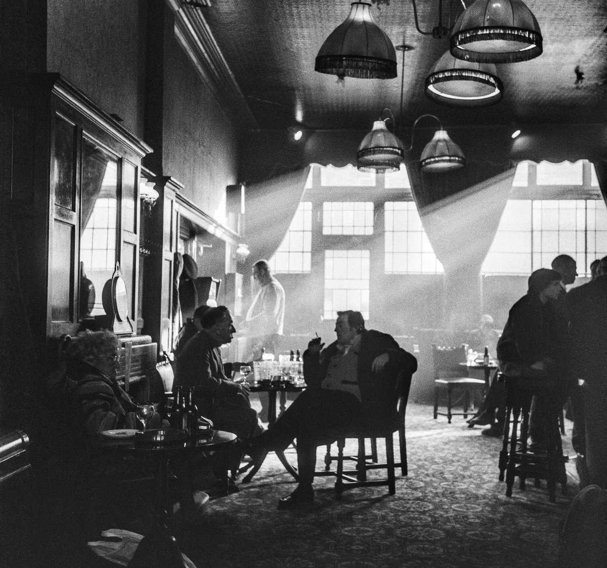 david_levenson's tweet photo. I miss smoky old pubs. Men in donkey jackets. Little old ladies in the corner, nursing a pint. My pic of a west london boozer, around 1979. ©David Levenson https://t.co/pFyFaWvAKq