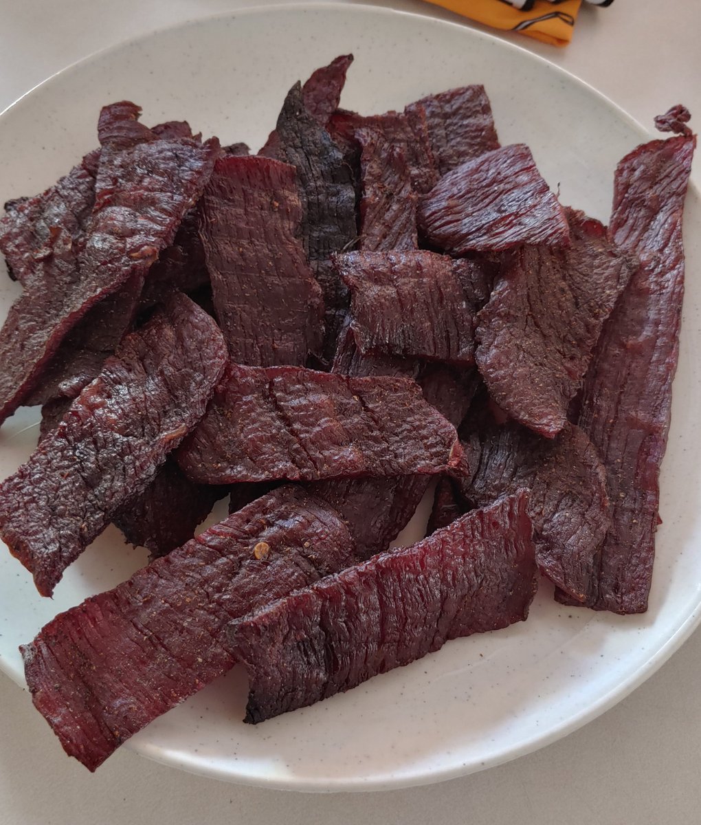 DrAcfa's tweet photo. @KINGS1973 @jeff_warrack 1st Attempt of Beef Jerky on my #CampChef pellet grill today, turned out great. Pretty spicy with 2 jalapenos in batch. Will make it last longer. #beef #eyeofround https://t.co/zsHpsIuOL7