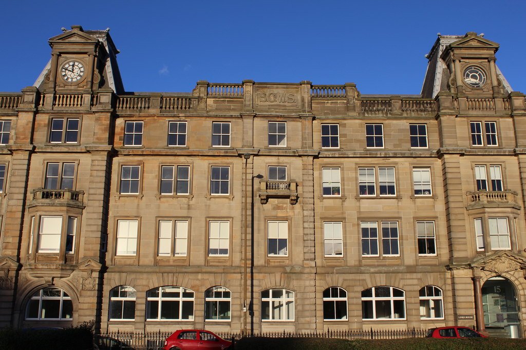 In 1879, the Scottish Co-operative Wholesale Society built a grand office and warshouse on Leith Links called "Great Michael House" (the left half of the building) (pic = Geograph, Leslie Barrie)