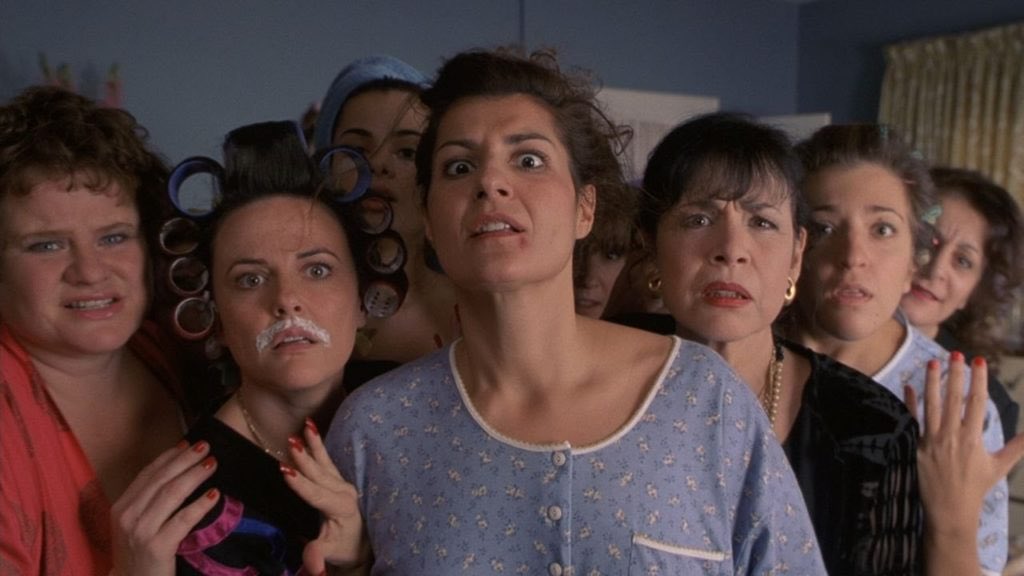  My Big Fat Greek Wedding (2002), which tells the tale of a Greek woman struggling between falling in love with a foreigner and her family's acceptance 