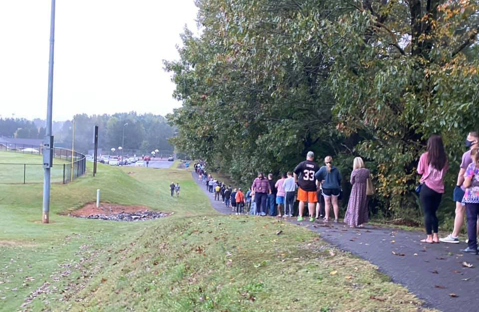 Cumming is Red state GA. A lot of Forsyth is too. Rural. White. Conservative. I voted at a place called the Coal Mountain Park Community Building. Here’s a photo taken today by the Forsyth County News of my polling place. Well the line to it. The building is beyond the trees. 2/n