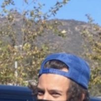 virgo: the front part of his hair under the hat