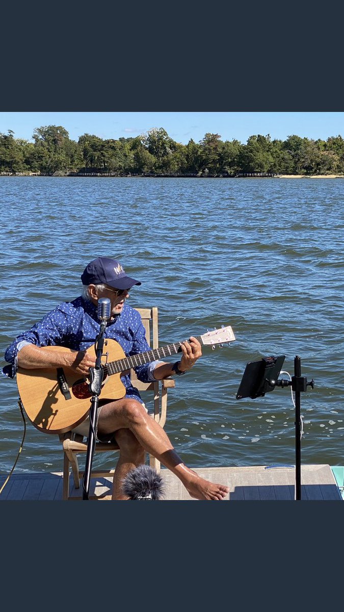 CoachRowellj's tweet photo. Playing guitar with Jimmy Buffett by the ocean. #goals #changesinlatitude https://t.co/FrpRxgYEGJ