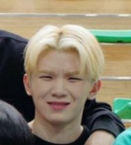 Jihoon: "When you're sad but picture is being taken so you gotta smile to the camera" face