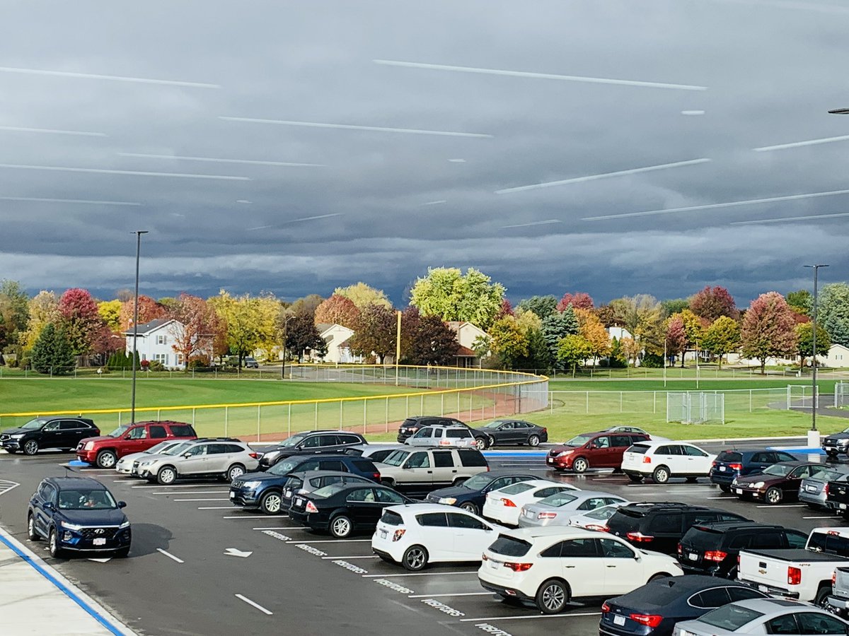 LCimshsLibrary's tweet photo. A gloomy day...but the view of the Fall leaves make up for it. 🍁 Miss seeing students in the library but please remember we are still here to help - just an email away! ~Mrs. Ackermann &amp; Mrs. Janco https://t.co/Cr6vy798Cv