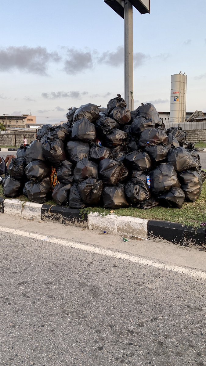 Gidi_Traffic's tweet photo. “@chimeeadioha: A phone pressing generation that cleans up after protest. This country doesn’t deserve us at all: #SARSMUSTEND 
#SarsMustGoNow https://t.co/grx324LX8Y