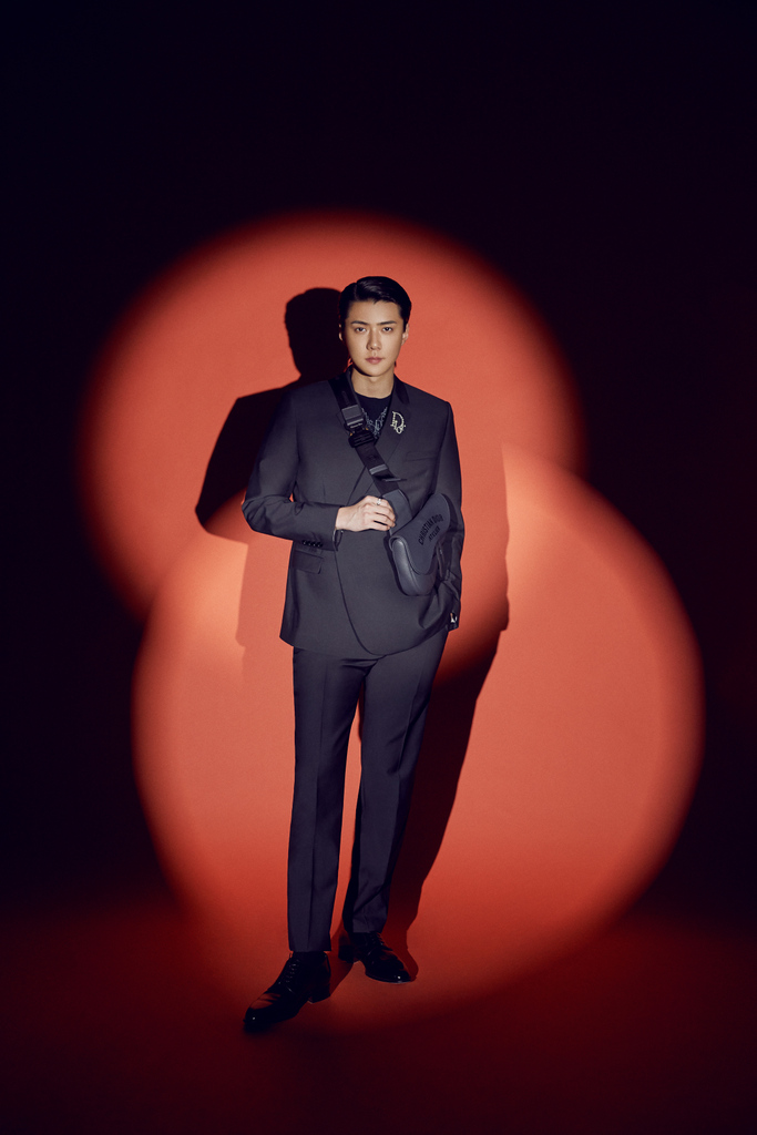 Dior's tweet photo. Singer-songwriter, actor and @WeAreOneEXO member Sehun models #DiorWinter20 by Kim Jones https://t.co/MQhDcJWXiR for @EsquireKr, a collection whose blousons, paisleys and safety pin embroideries reference the work of the late British designer and stylist Judy Blame. https://t.co/61L84fMuMT