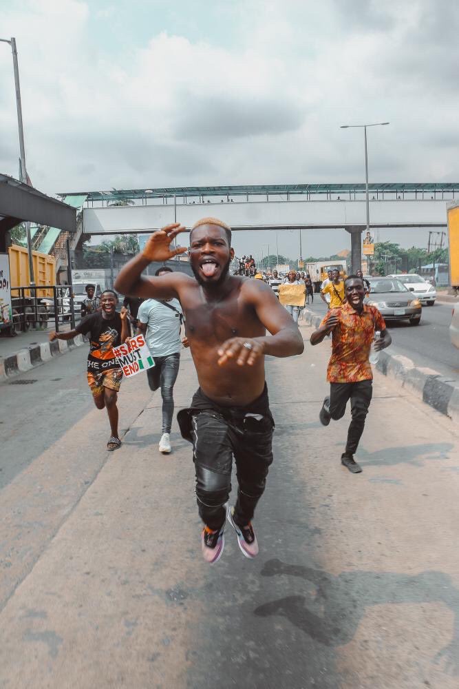 Yesterday I walked from Unilag to Maryland AND BACK! I had plans to rest today... till I got my first threat call last night after the protest, Lewl, The people they have killed would rest enough for all of us! So today again, WE MOVE! #EndSARS #SarsMustGoNow #SarsMustGoNow