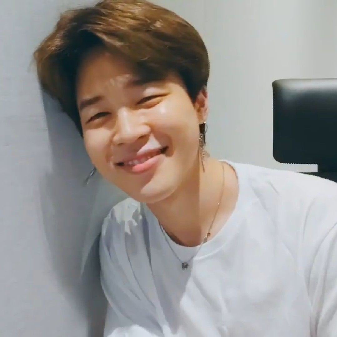 when he leans in and smiles