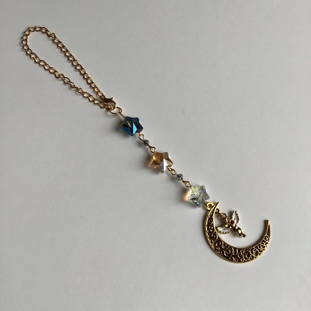 IBaubliene's tweet image. A great gift 🎁 
Golden Moon, Angel Charm with Rainbow Star Chain for Car from my #etsy shop #accessoriesbyairita etsy.me/33VWdw2
 #rainbowstar #angelcharm #goldenmoon #decorforcar #caraccessory #christmasgift #christmasuk #giftuk #handmadeuk #redrobin #giftonetsy