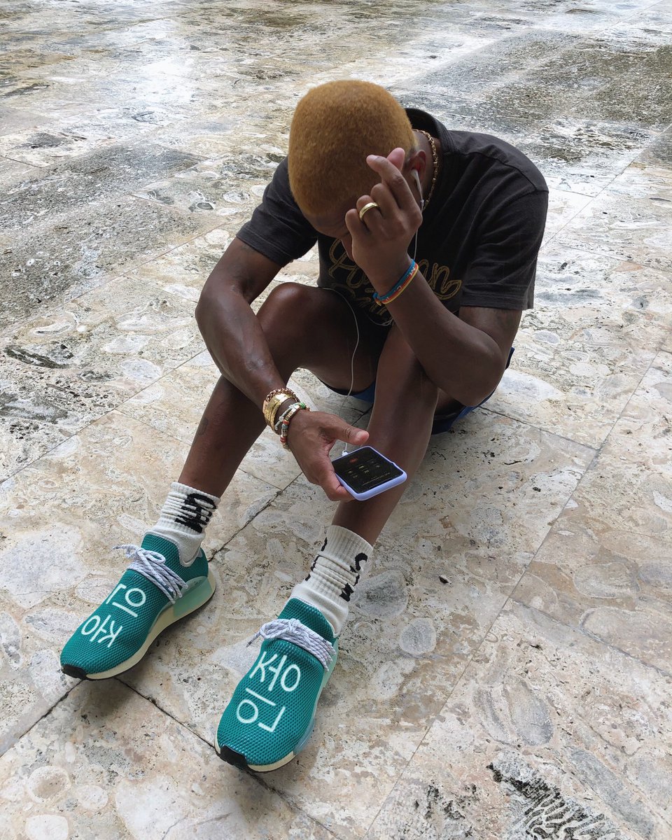 pharrell williams wearing human race shoes