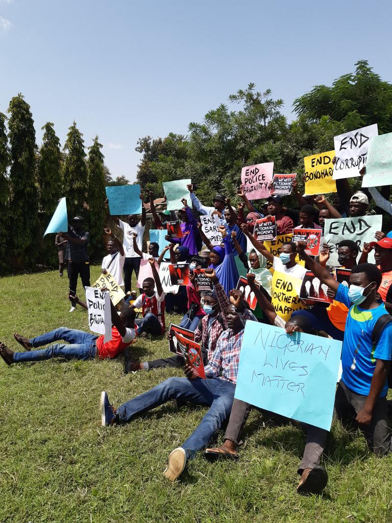 Zaria people at "house of assembly" mini garden.