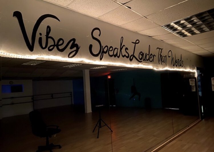There is a giant slogan in the dance studio that reads 'Vibes Speaks Louder Than Words'.Another photo is accompanied by the words ‘Progress is Impossible Without Change'.[photo:  http://vibezinmotion.com ]