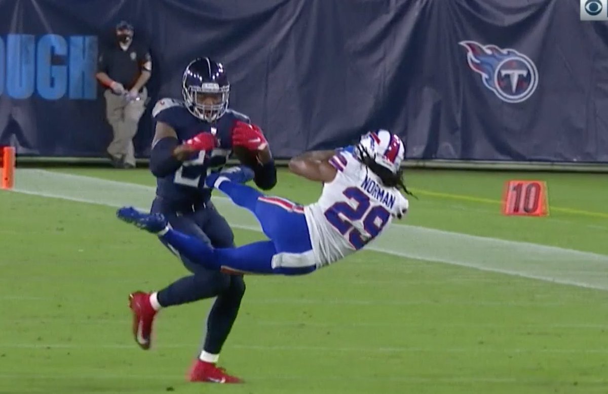 PFTCommenter's tweet photo. Silver lining for Josh Norman you can always frame this picture and pretend u landed a absoluteley devestating scissor kick to Derrick Henrys ribs https://t.co/VTUjRYnDAH