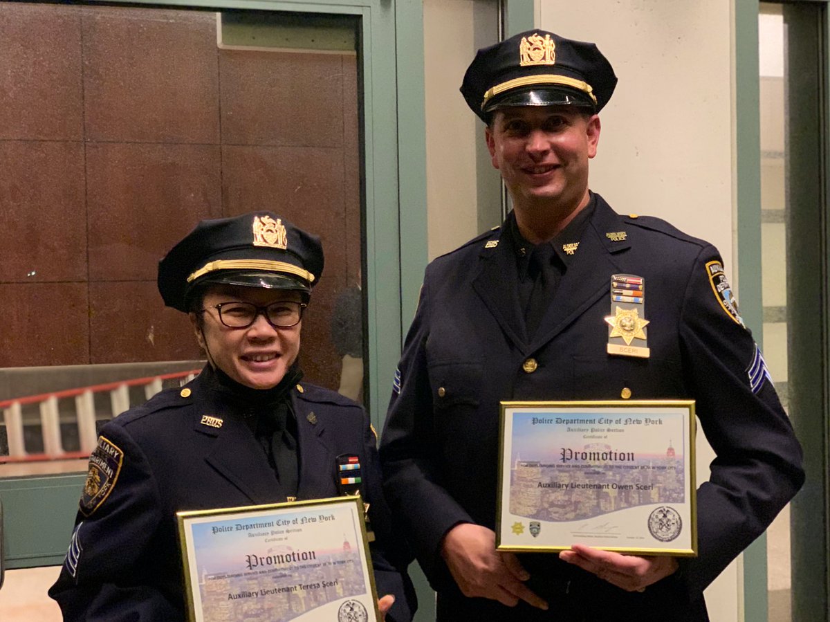 NYPDauxiliary's tweet photo. Surrounded by their @NYPDQueensSouth Auxiliary family, husband and wife Owen and Teresa Sceri were both promoted to the rank of Auxiliary Lieutenant! Congratulations! https://t.co/RKEHToNM4U