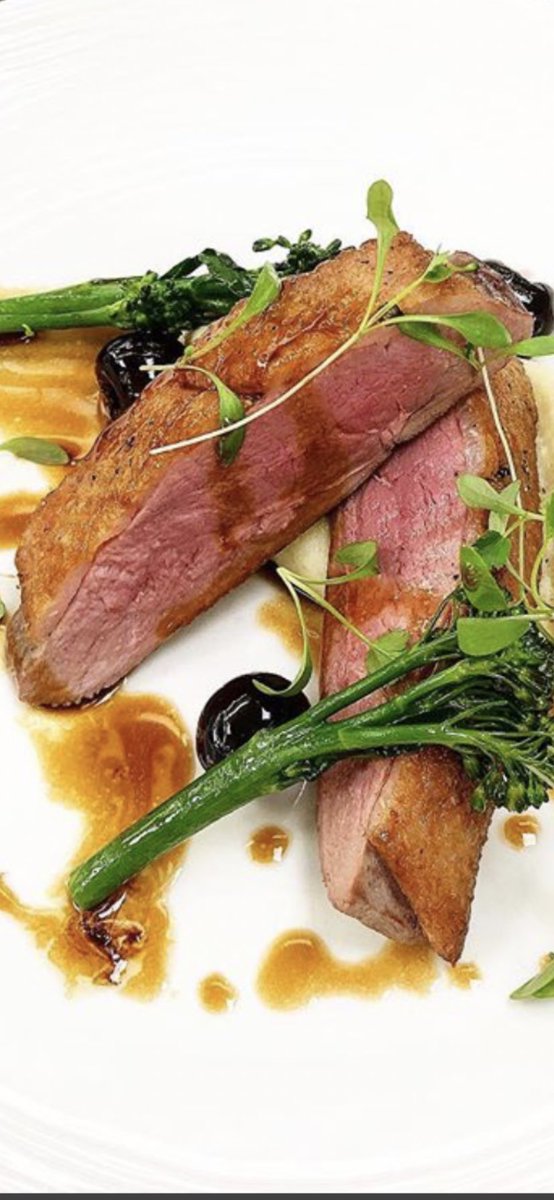 PeterDorans1's tweet photo. Pan fried duck with tender stem black cherry, honey and cherry reduction. https://t.co/SLOP6JhJWM