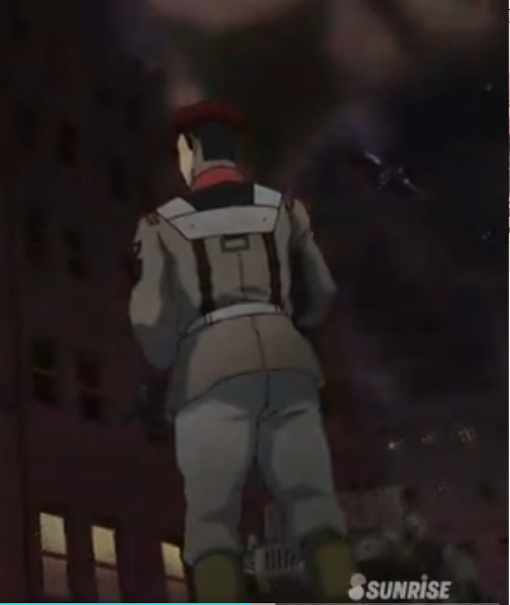 The second appears in "The Origin" and has rectangular puffer padding over the shoulder straps, material sitting over the shoulder blades, and two parallel straps down the back. There are tan and brown variants.