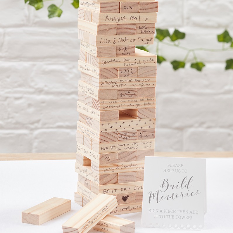 Guests will love leaving a message for the happy couple and then playing a fun game of Jenga. 

#weddingideas #weddingguestbooks #cuteweddingideas #funweddingideas #weddingfun #brides #weddingplanning