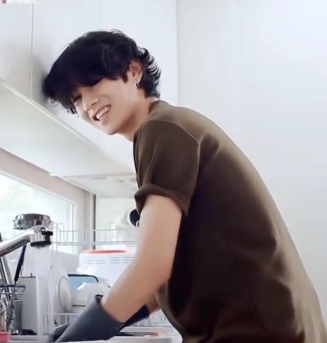 happily washing the dishes