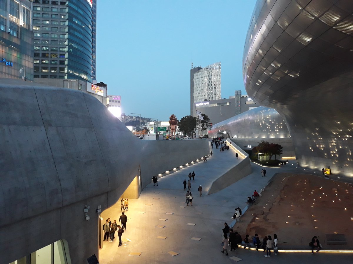 8. Dongdaemun Design Plaza (DDP) ... Dongdaemun translated into English means east (dong) dae (great/big/large) mun (door/gate/entrance) ... first pic is a line of Taegukgis next to the plaza on the roadside