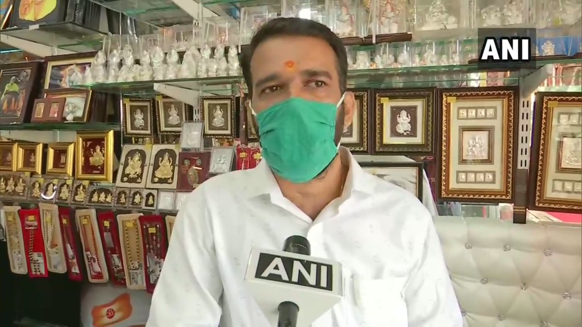 ANI's tweet photo. Maharashtra: Shopkeepers outside Shirdi Sai Baba Temple say they are incurring losses due to state govt's decision of not opening religious places in the state. 

A shopkeeper says, "We suffered financial loss due to COVID included lockdown &amp; now govt is adding on to our misery." https://t.co/oxAMDbuTNs