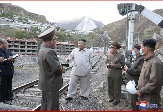 Kim Jong Un's been on a visit to a mining town to inspect housing being built after a natural disaster.Trousers: Massive  #kimjonguntrouserwatch