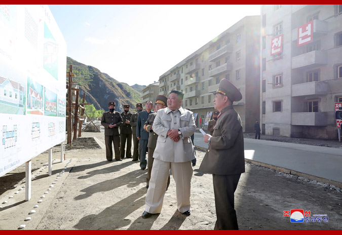 He pretty much said "God this is a dump, why aren't we rebuilding the whole place?" and his word is law. Also, trousers.  #kimjonguntrouserwatch