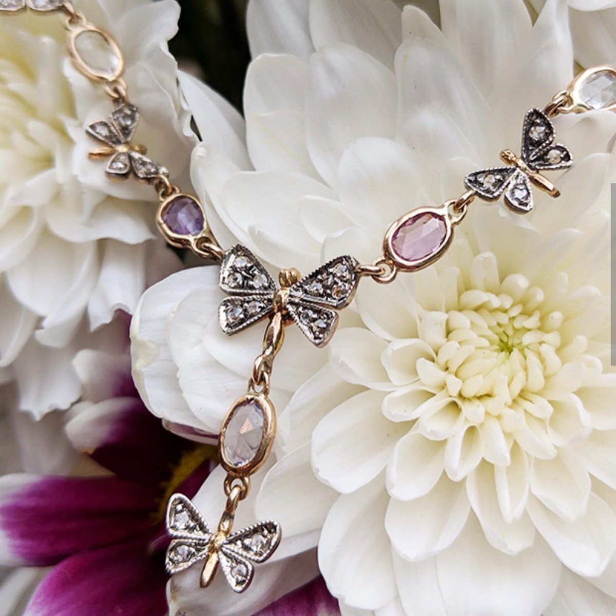 chainsofgolduk's tweet image. Handmade in Italy, this wonderful necklace features 3.5cts of purple and colourless rose cut oval sapphires set in solid 14ct yellow gold. 
Silver tipped butterflies with a total of 0.50cts of rose cut diamond adorning the wings.
Shop with confidence 
chainsofgold.co.uk/shop/antique-s…