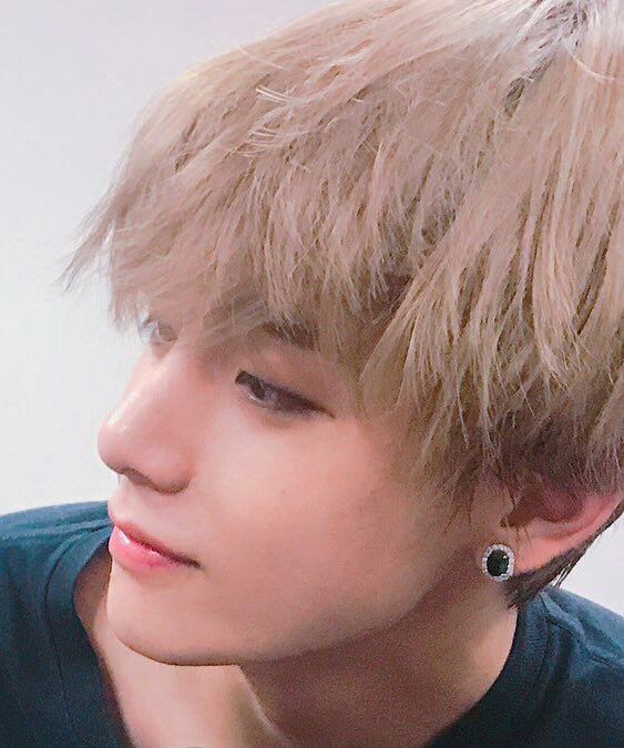 Tae's lip mole ; y'all see that baby one at the corner