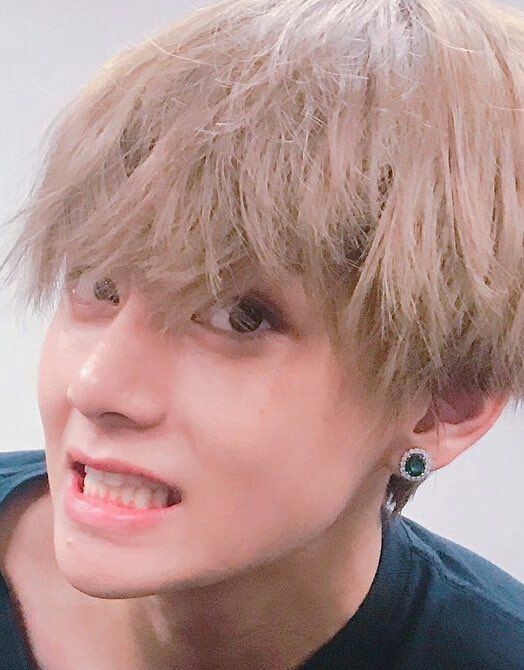 Tae's lip mole ; y'all see that baby one at the corner