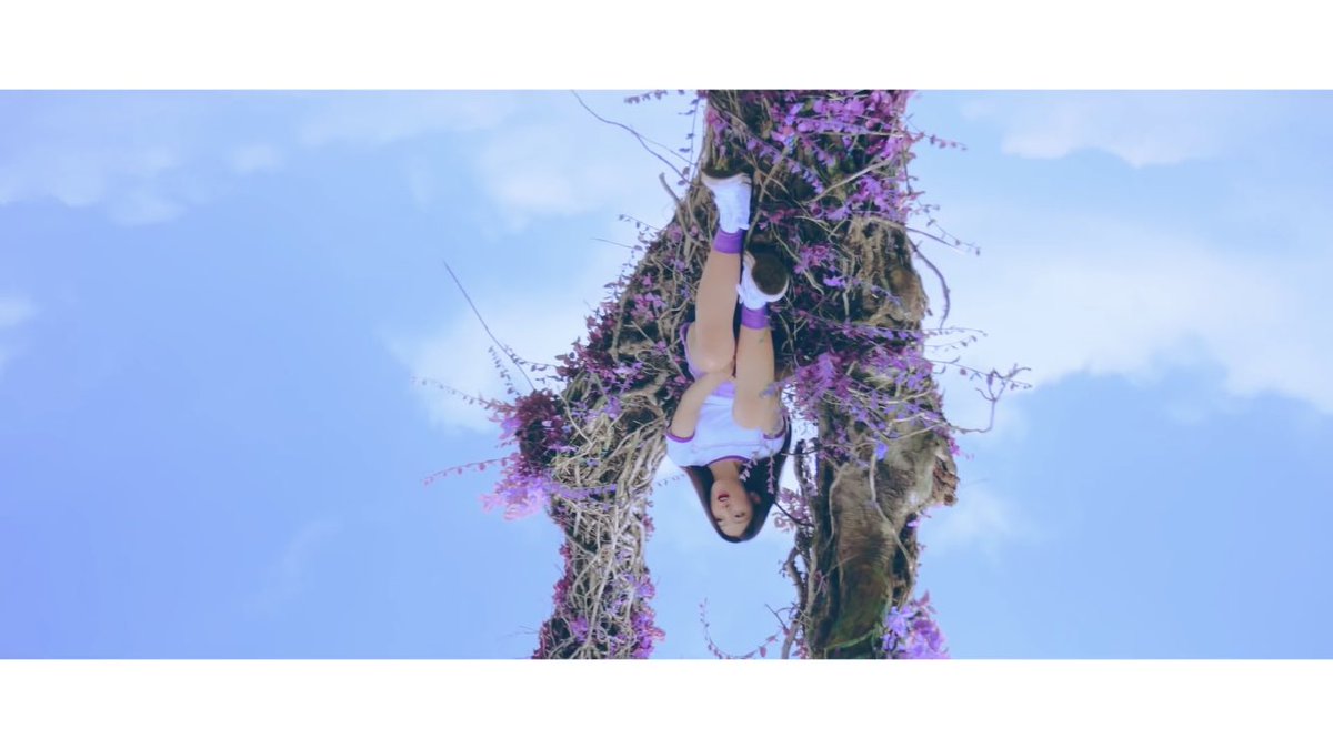 Choerry appears to be “upside-down” same as her representative animal, a bat, the same way she was resting on a tree in ‘Love Cherry Motion’ MV. We can also see her reflection the same way she’s always had a doppleganger (*cough* Hyunjin)