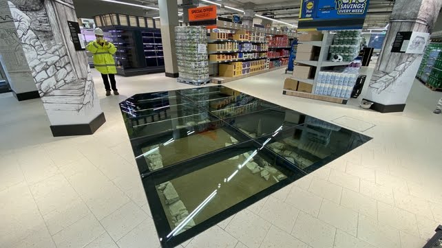 GeneralRhivous's tweet photo. A lidl opened in Dublin whilst keeping the archaeology underneath in tact and viewable through glass panels. MORE OF THIS PLEASE. https://t.co/TAAUFLcju8