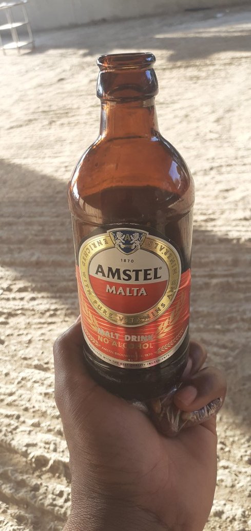 chestersino78's tweet image. This is Amstel Malta, it goes down well with Jellof Rice #GetJollofed #thecookoff #TeamNaija