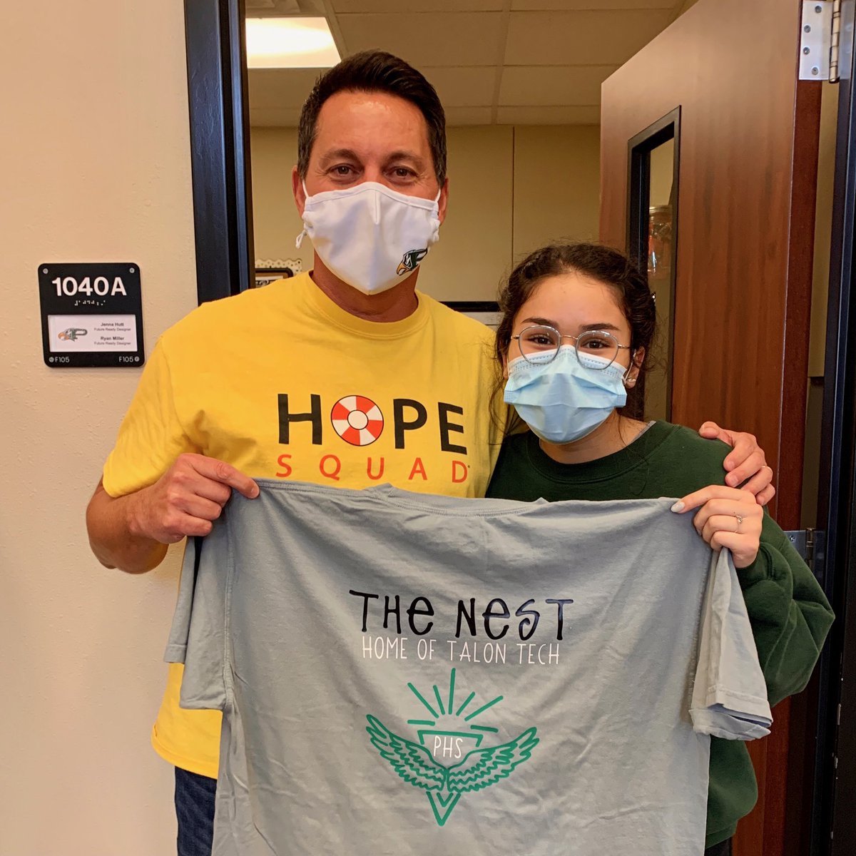PHS_TheNest's tweet image. Our @TalonTechPHS intern, Miranda, designed and drew our new logo. Using tools from our Makerspace, we were able to use it to make @JohnMBurdett his very own shirt.