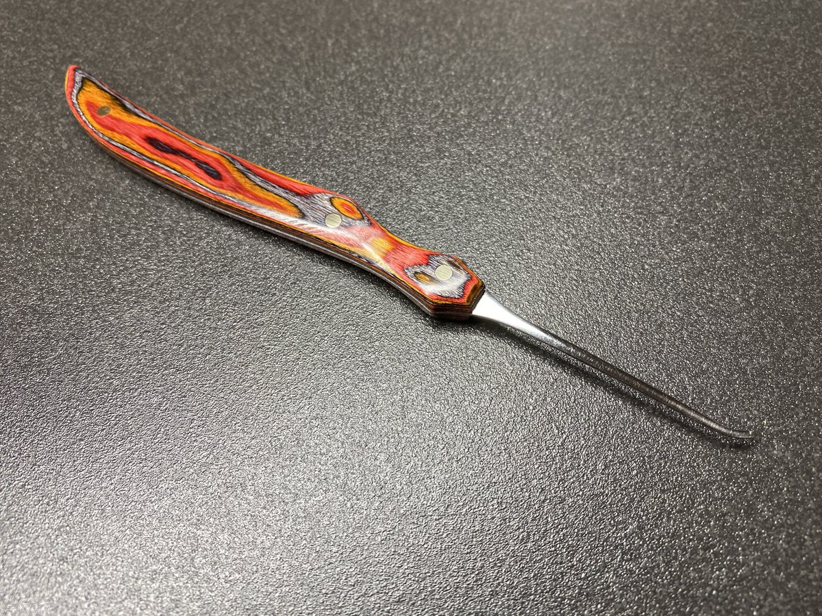 LockNoob1's tweet image. Red, yellow and blue laminated plywood scales, with a Law Lock Tools high yield 301 stainless full tang pick. Wax finish #lockpicktools #lockpicking #loocksport #locksmith
