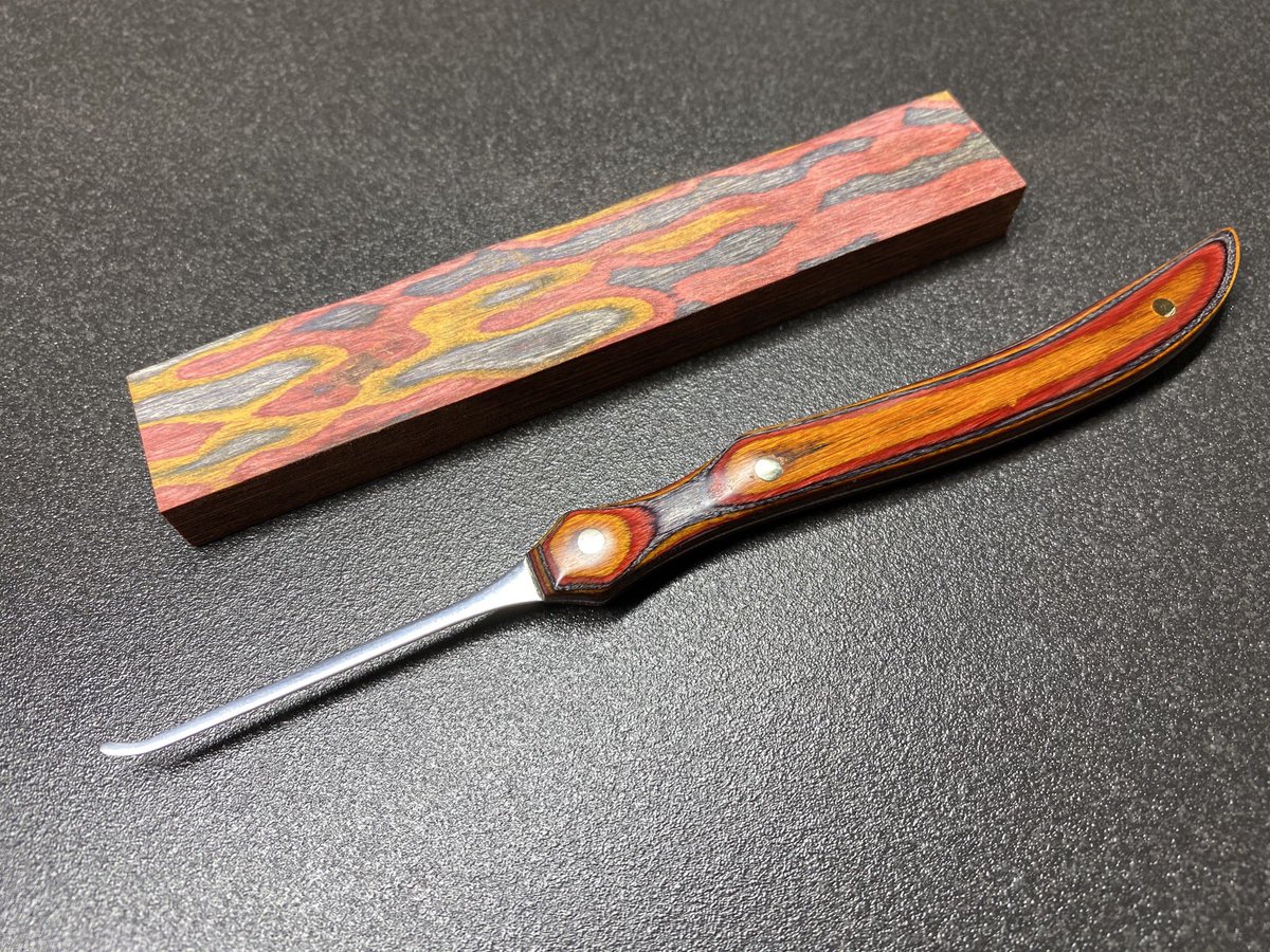 LockNoob1's tweet image. Red, yellow and blue laminated plywood scales, with a Law Lock Tools high yield 301 stainless full tang pick. Wax finish #lockpicktools #lockpicking #loocksport #locksmith